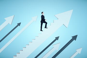 Businessman climbs the stairs in the form of arrow
