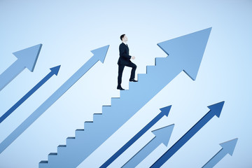 Businessman climbs stairs in form arrow