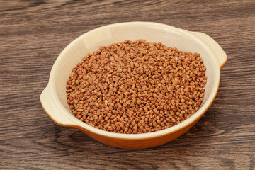 Raw buсkwheat cereal in the bowl
