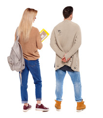 Back view couple in sweater.