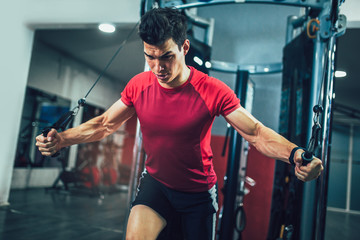 Caucasian man exercising suspension training trx