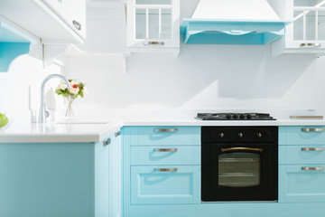 Luxury kitchen interior in white and blue tones