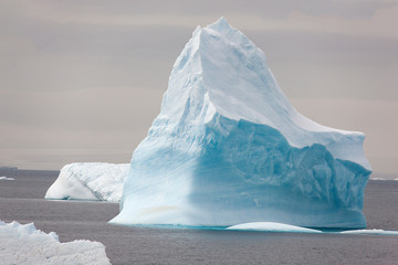Antarctica landscape with iceberg on a cloudy winter day