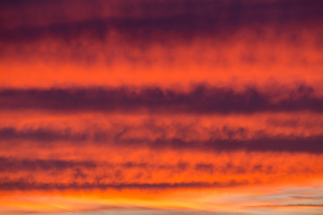 Dramatic red sunset sky in the sea