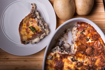 Mashed potatoes with mince beef, mushrooms and mozzarella cheese