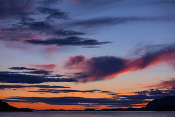 Dramatic red sunset sky in the sea