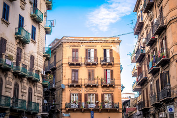 Palermo, ITALY - September 29, 2019 Typical Building facade with striped balconies