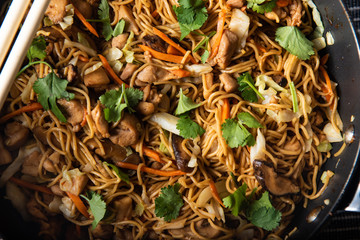 Home cooking of chicken fried noodles