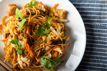 Home cooking of chicken fried noodles