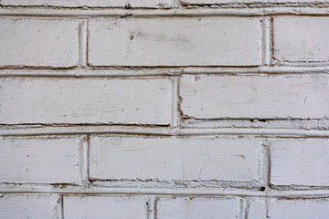 Brick wall, construction of light white bricks. The stony surface, made with your own hands during construction, is now a background and texture
