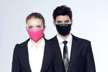 Men and women who were laid off from their companies during the novel coronavirus pandemic stare...