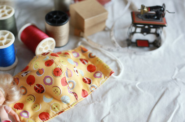 Beautiful vintage style of DIY cotton face mask.Concept background for new coronavirus 2019 disease/
(COVID-19),Zero waste and work from  home.