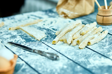 Naklejka premium Closeup process making homemade pasta. Fresh dough