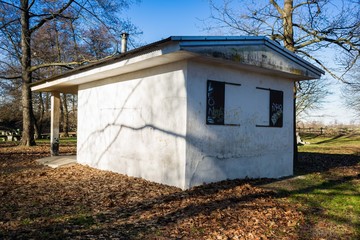 abandoned building in the middle of a wood