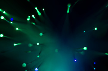 Blurred abstract pink and blue bokeh lights. Fiber optic defocused background.