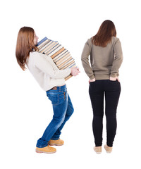 Back view of two woman in sweater.