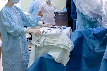 The process of carrying out a surgical operation using a modern robotic surgical system. Medical...