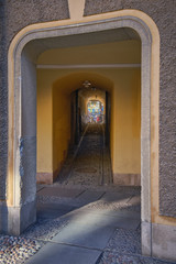 Quiet, deserted narrow street in the old part of Stockholm inside a medieval house