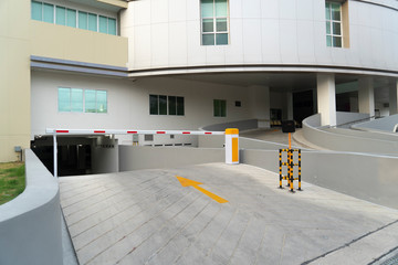 Parking place of the building, with automatic barrier system