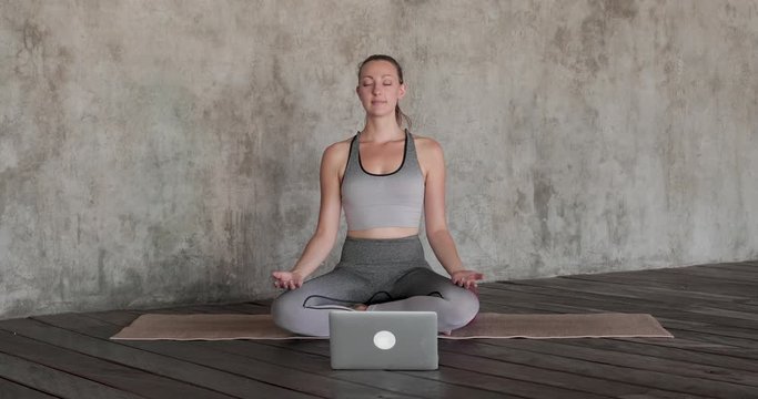 Woman Doing A Meditation Class Online