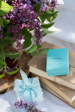 Minsk, Belarus. May, 2020. Tiffany jewellery gift box. Present. Flowers. Best gift for Valentines Day and Mothers day. 8 march. Engagement and wedding. Gift card.
