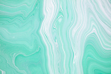 Fototapeta premium Fluid art texture. Abstract background with iridescent paint effect. Liquid acrylic artwork with beautiful mixed paints. Can be used for interior poster. Mint and white overflowing colors