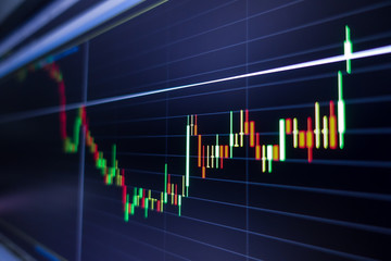 Stock exchange market graph on screen monitor. Economic and financial concept.
