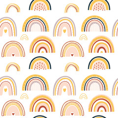 Baby rainbow seamless pattern. Vector Illustration. Nursery pattern in hand drawn scandinavian style. Texture for fabric, textile, wrapping and wallpaper.