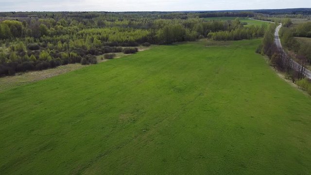 Aerial: Borodino battlefield. Flight from the positions of Bagrationov's Fleches to the Shevardinsky redoubt (the place of Napoleon Bonaparte during the battle). Borodino, Russia. May, 2020.