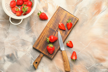 Composition with ripe strawberry on table
