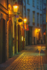 Obraz premium Night street of old Prague Under the light of lanterns