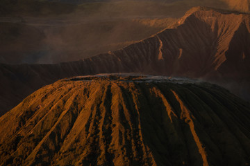 Landscapes and sunrise details at the Batok mountain, and the Tengger massif, in East Java, Indonesia.