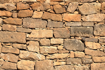 Big yellow wall from stone bricks