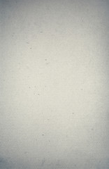 sheet of grey paper with a textured surface