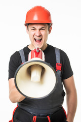 Full length of worker speaking into megaphone isolated over white background