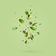 Creative mockup with flying various types of spices Bay leaf, red pepper, anise on green background with copy space. - obrazy, fototapety, plakaty