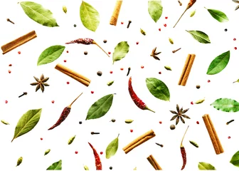 Rolgordijnen Flying spices Bay leaf, red chili pepper, anise, cinnamon sticks isolated on a white background. pattern. © PINKASEVICH
