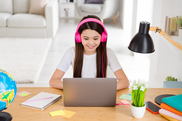 Photo of little pretty pupil small school lady turn on skype laptop notebook online lesson video...