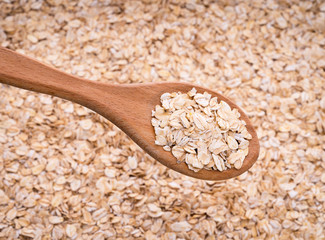 Natural oatmeal flakes, healthy food ingredients with vitamins.