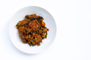 Thai spicy food, Stir fried catfish on dish on white background.