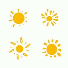 Set of painted yellow suns. Vector solar symbols set.