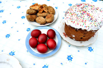 Ukrainian Easter with colored eggs and snacks