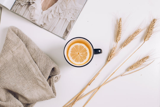 Flatlay Of Morning Routine With Reading Magazine And Drinking Tea