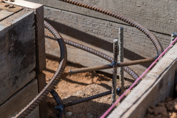 Armature in the formwork for the foundation. Building construction