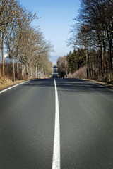 long straight road which is empty