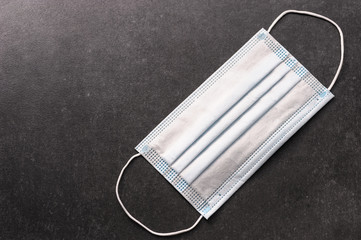medical disposable mask on the table to protect against epidemics and viruses