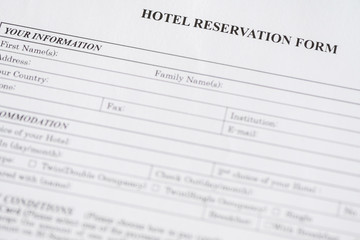 Hotel reservation form. Hotel service. Reception desk, registration. Close up. Selective focus.