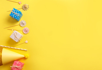 Bright gift boxes on a yellow background. Concept for birthday, mother's day, valentines day, father's day