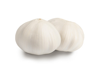 two heads of garlic isolated on white