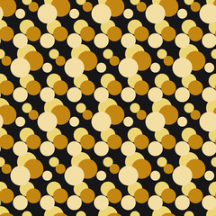 Golden circles of various sizes and shades on a black background. Seamless pattern. Background for parties, photo shoots, and other uses.